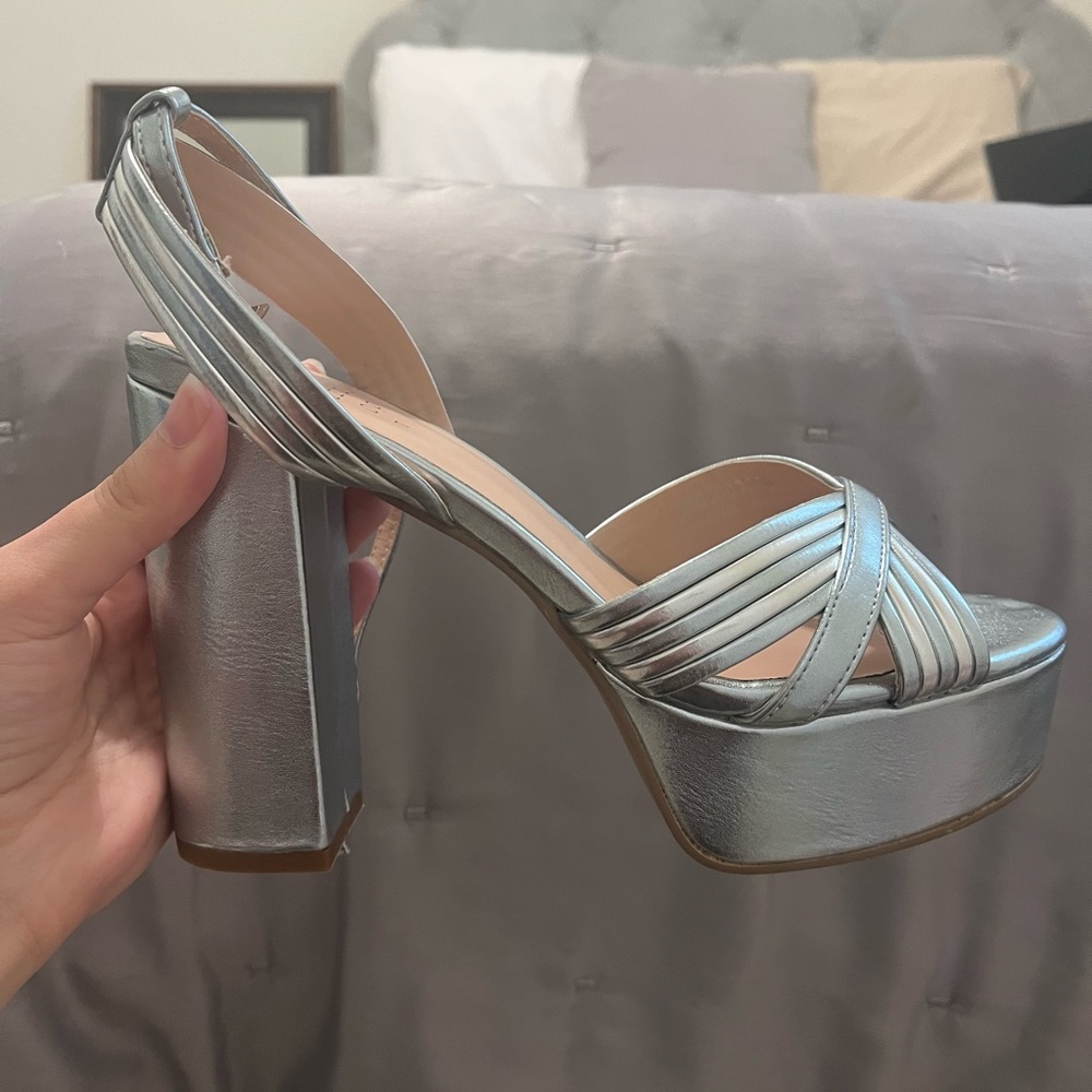 silver heels size 7.5 never worn